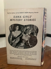 The Sign of the Twisted Candles