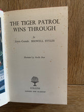 The Tiger Patrol Wins Through