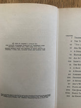 The Sign of the Twisted Candles