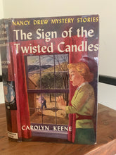 The Sign of the Twisted Candles