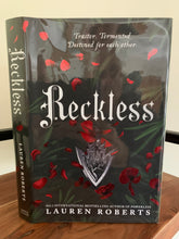 Reckless with red sprayed edges