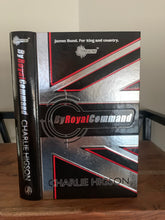 By Royal Command with sprayed red page edges (signed)